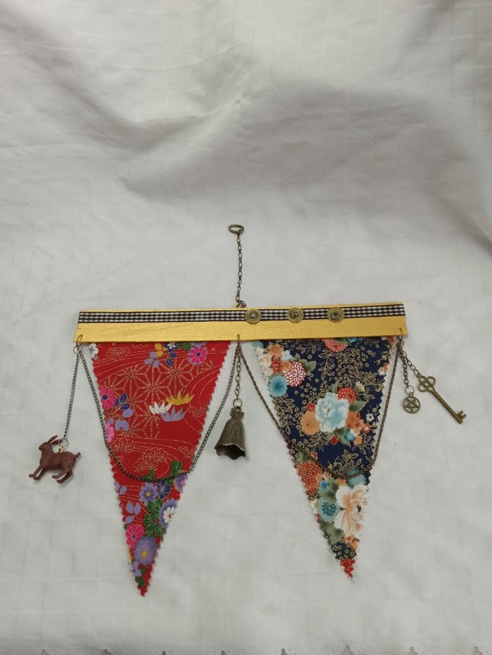 7-A reversible, handmade hanging banner made with fabric, chains, charms & coins